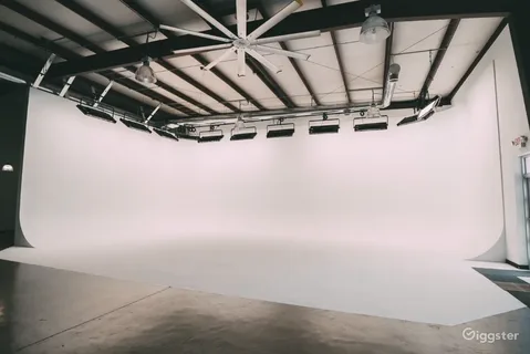 Studio with a large white cyclorama wall